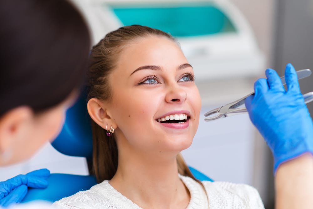 Tooth extraction beautiful girl in dentistry - Wisdom Teeth Oro Valley AZ